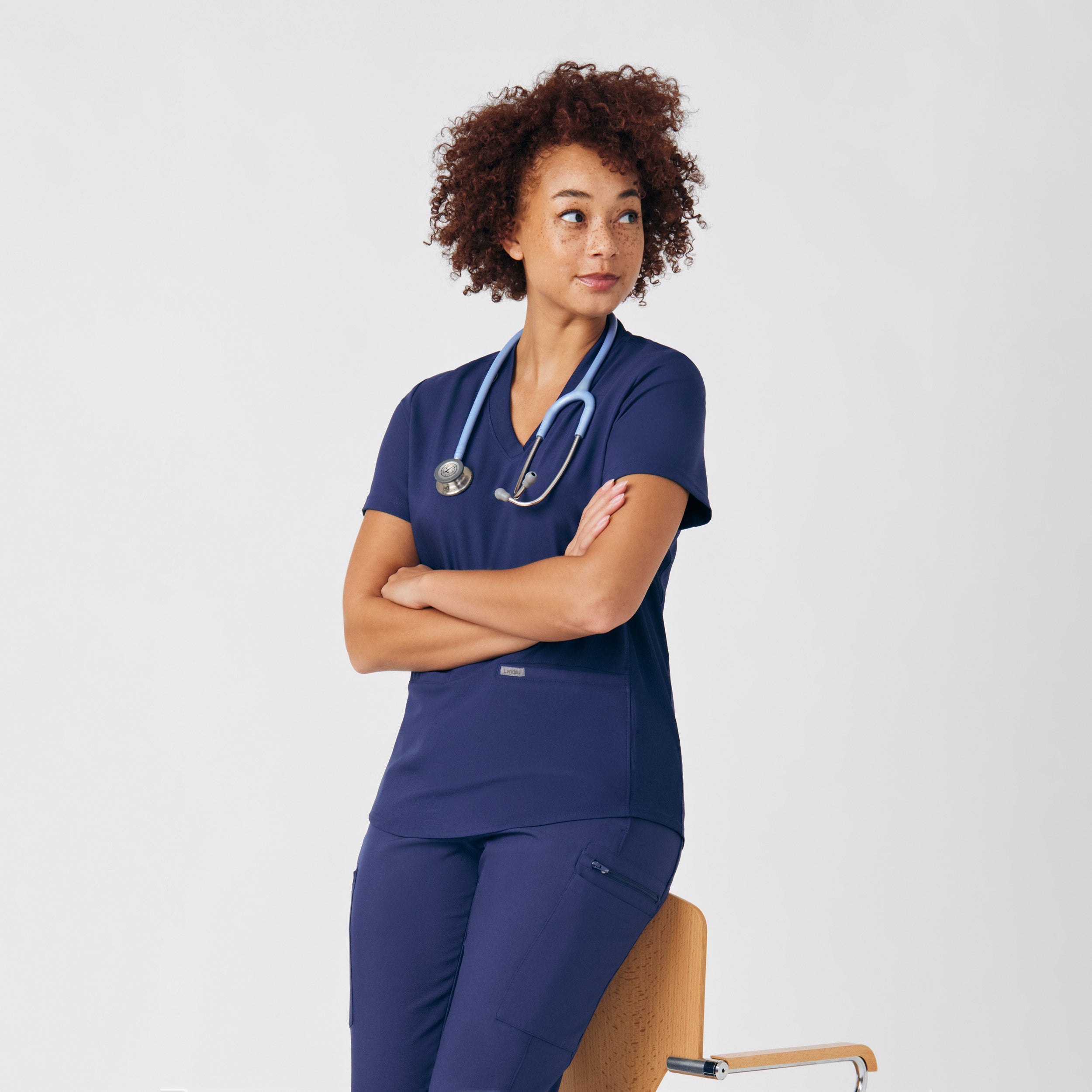 Landau Forward 3-Pocket V-Neck Top style LT100 scrubs — San Antonio